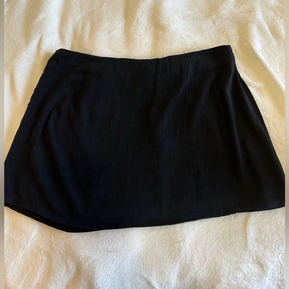 Princess Polly black mini skirt curve
